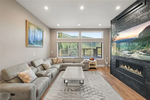 a kitchen with stainless steel appliances a sink stove top oven and cabinets