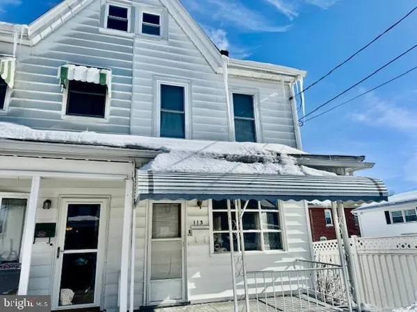 a front view of a house with windows
