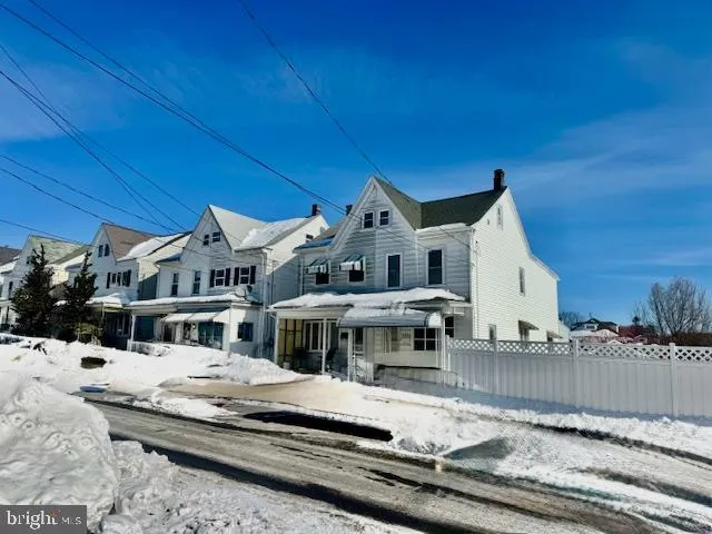 a view of houses with outdoor space