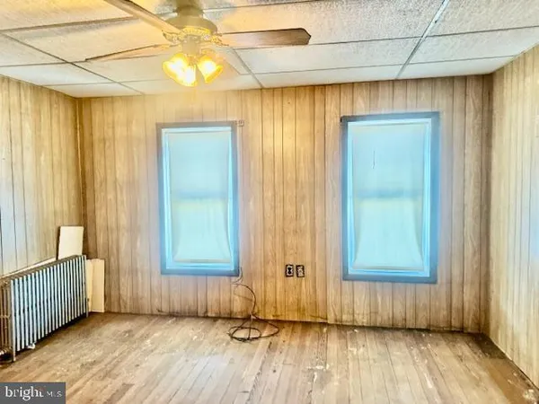 a view of a living room with furniture