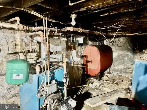 with a vase of flowers sitting on a table