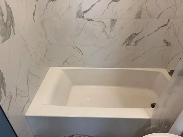 a bathroom with a bathtub