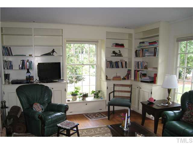 2756 McDowell Road Durham, NC 27705 - Photo 18 of 25 Family Rm has custom cabinetry/bookshelves, recessed window with box seat & large window with nice views to the front yard. Den/Family/Great Room