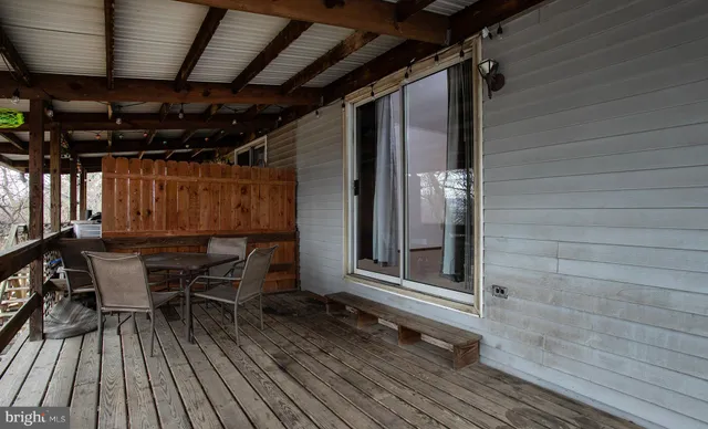a view of a car in wooden deck