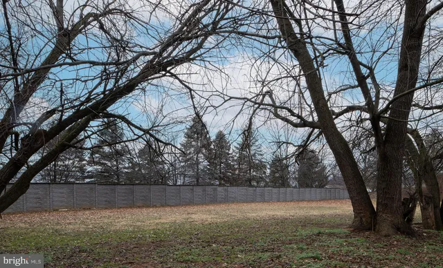 a view of patio with a yard