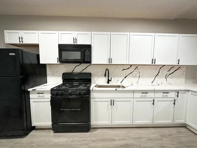 a bathroom with a toilet and a sink