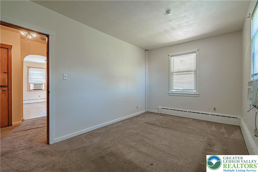 1115 Chestnut Street Coplay, PA 18037 - Photo 12 of 32 an empty room with windows