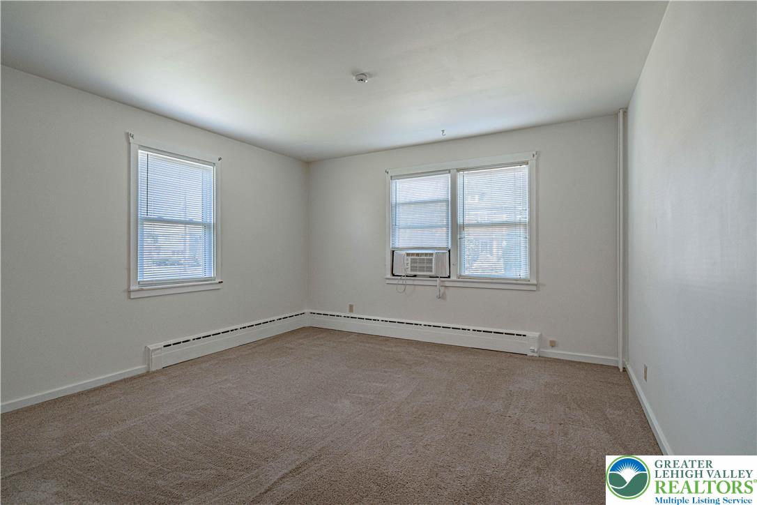 1115 Chestnut Street Coplay, PA 18037 - Photo 14 of 32 an empty room with windows