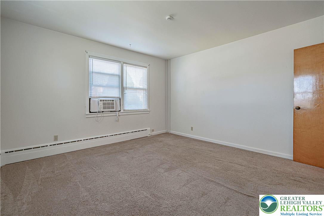 1115 Chestnut Street Coplay, PA 18037 - Photo 15 of 32 an empty room with a window