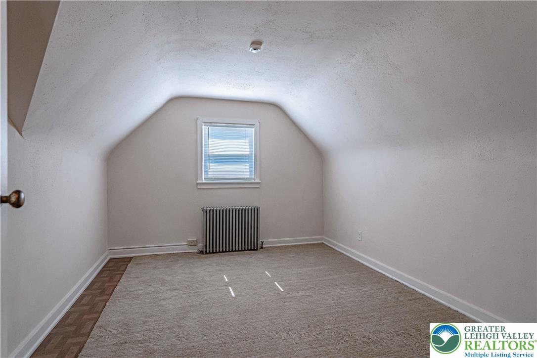 1115 Chestnut Street Coplay, PA 18037 - Photo 16 of 32 an empty room with a window