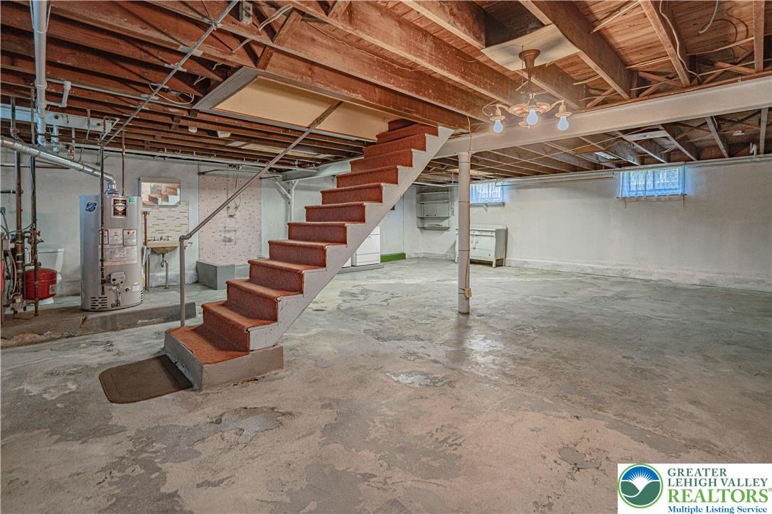 1115 Chestnut Street Coplay, PA 18037 - Photo 23 of 32 a view of an empty room with stairs
