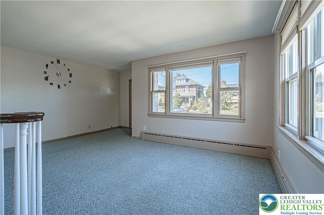 1115 Chestnut Street Coplay, PA 18037 - Photo 4 of 32 an empty room with windows