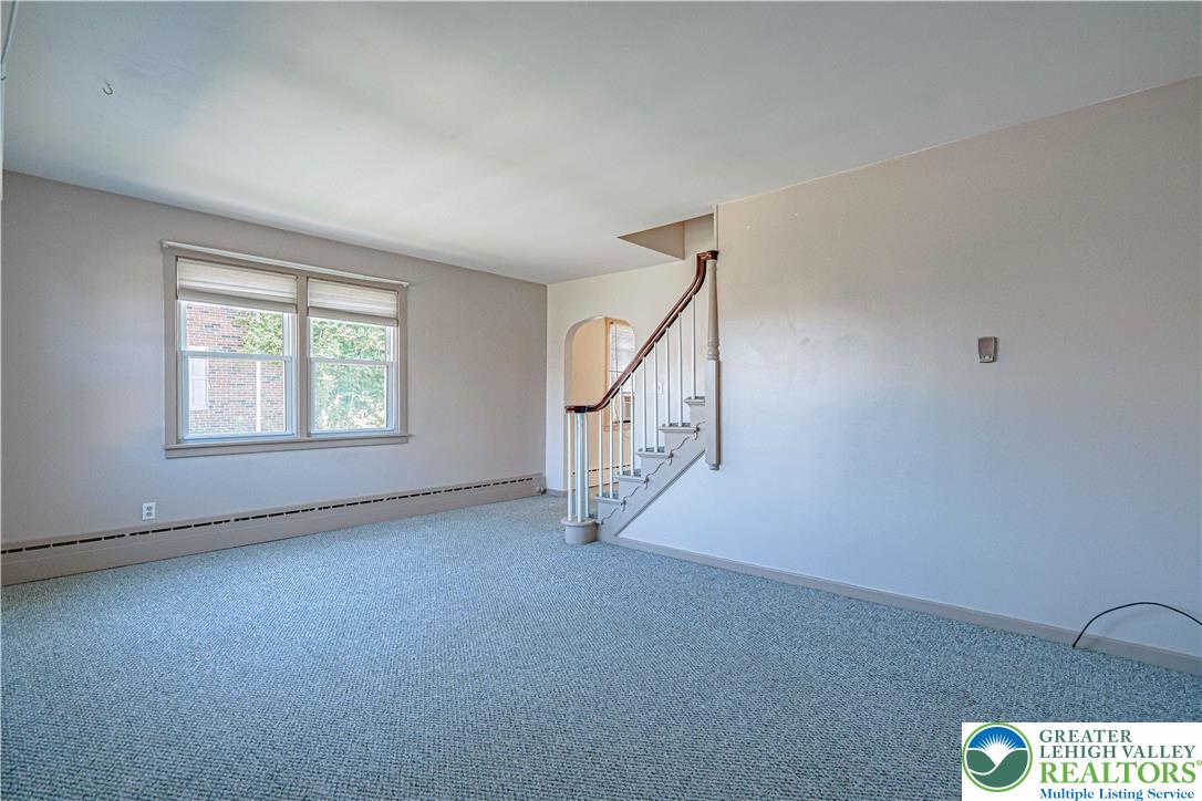 1115 Chestnut Street Coplay, PA 18037 - Photo 5 of 32 an empty room with windows