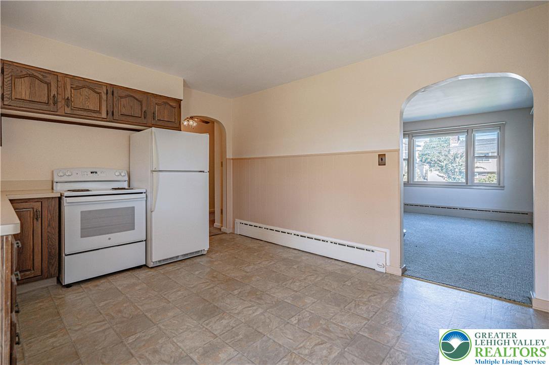 1115 Chestnut Street Coplay, PA 18037 - Photo 7 of 32 a view of a kitchen with washer and dryer