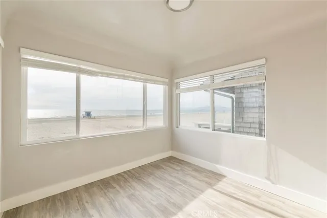 a bedroom with bed and window