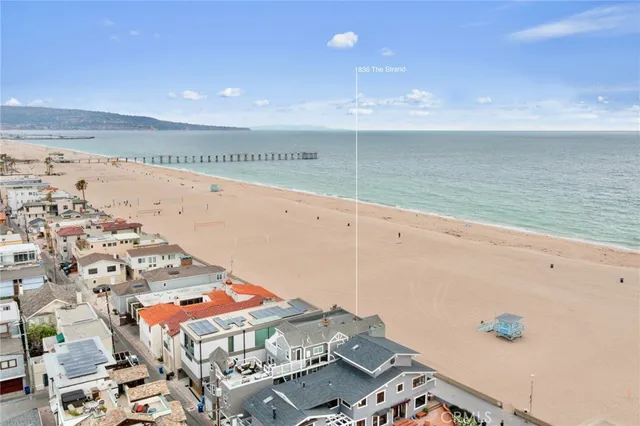 a view of room with furniture and wooden floor
