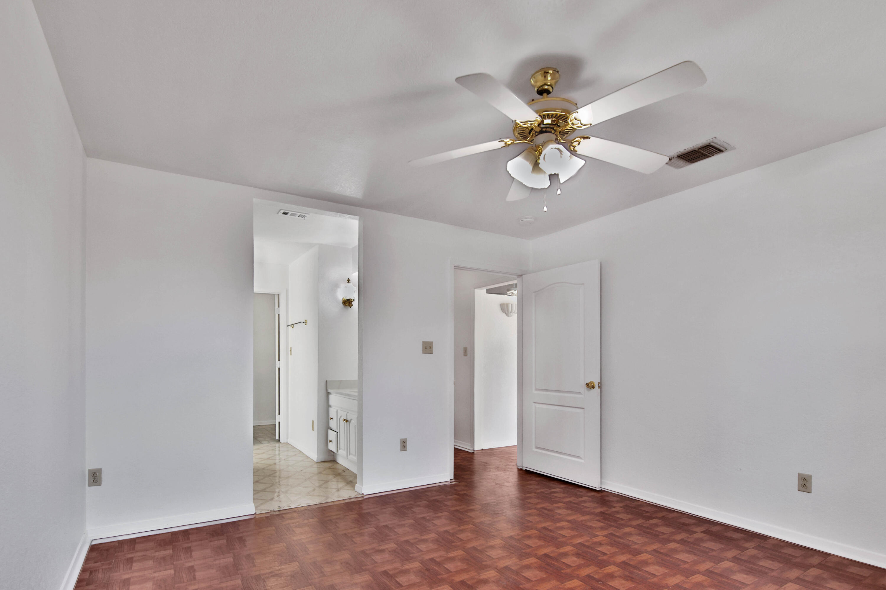 4913 56th Street Lubbock, TX 79414 - Photo 20 of 32 wooden floor in an empty room with a window