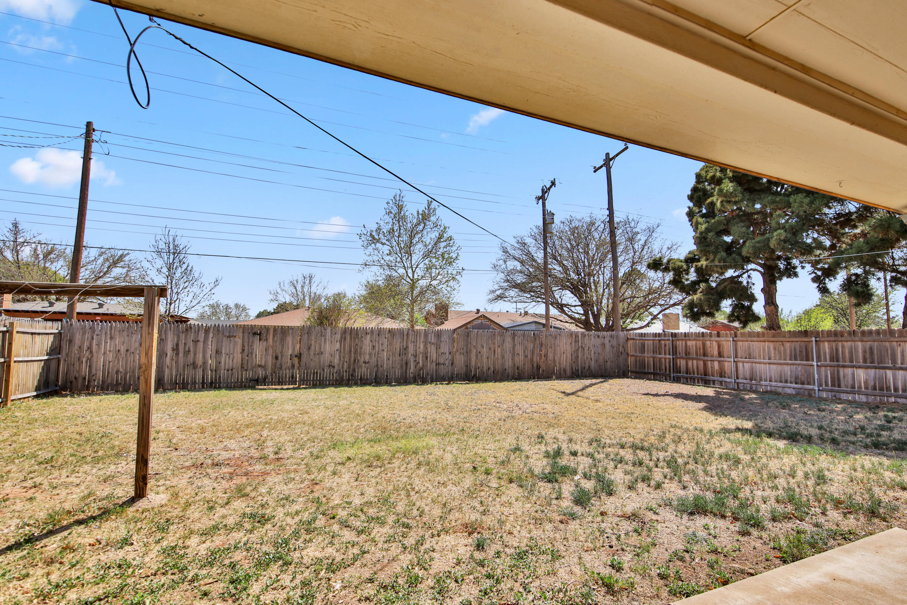 4913 56th Street Lubbock, TX 79414 - Photo 31 of 32 a view of a backyard