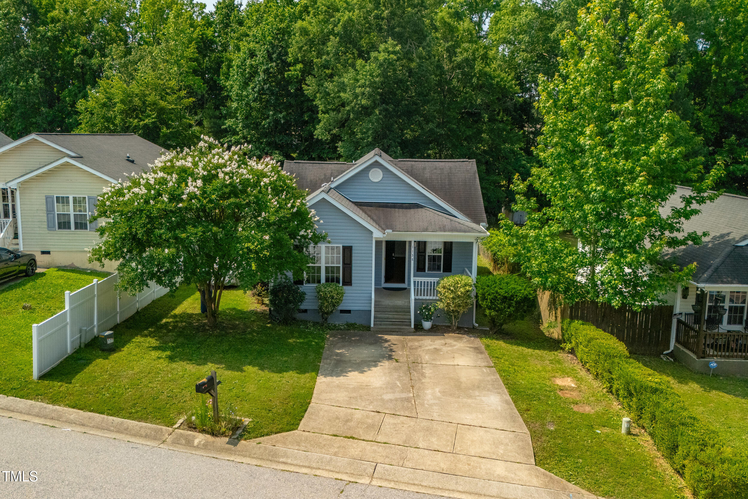 1138 Ricochet Drive Raleigh, NC 27610 - Photo 2 of 27 a front view of a house with garden