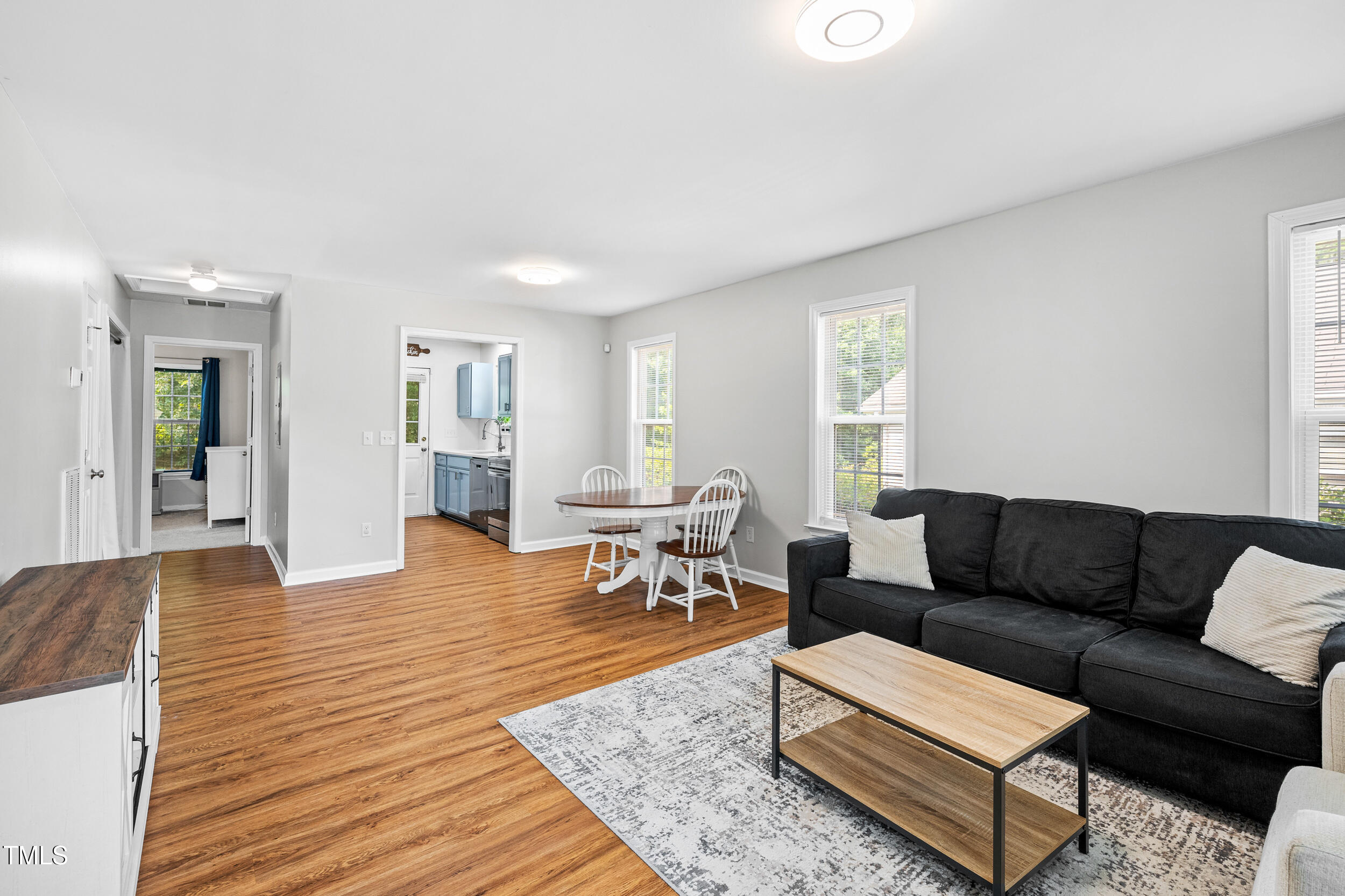 1138 Ricochet Drive Raleigh, NC 27610 - Photo 5 of 27 a living room with furniture and wooden floor