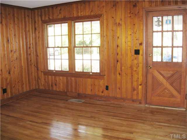 232-c C Cc Routh Road Bear Creek, NC 27207 - Photo 11 of 24 an empty room with wooden floor and windows