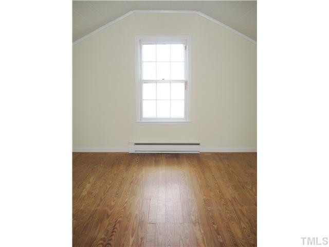 232-c C Cc Routh Road Bear Creek, NC 27207 - Photo 15 of 24 a view of a room with wooden floor and a window