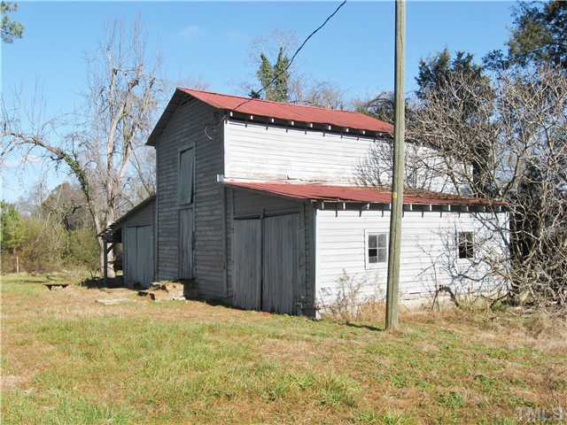 232-c C Cc Routh Road Bear Creek, NC 27207 - Photo 18 of 24 a view of a house with a yard