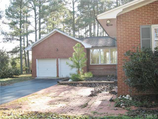 232-c C Cc Routh Road Bear Creek, NC 27207 - Photo 5 of 24 a front view of a house with garden