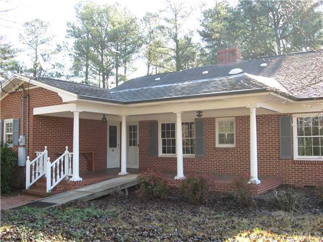 232-c C Cc Routh Road Bear Creek, NC 27207 - Photo 6 of 24 a view of a house with a yard