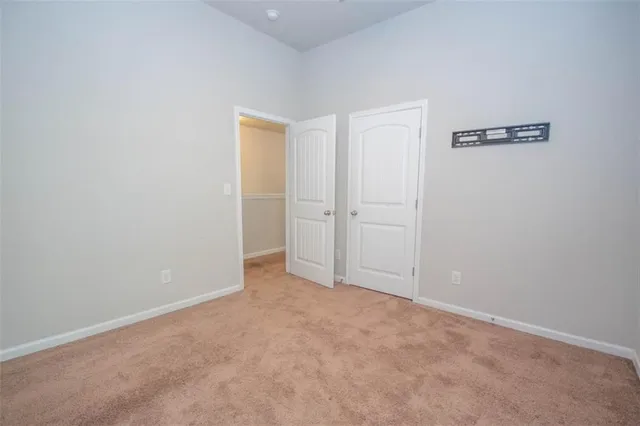 an empty room with an entryway
