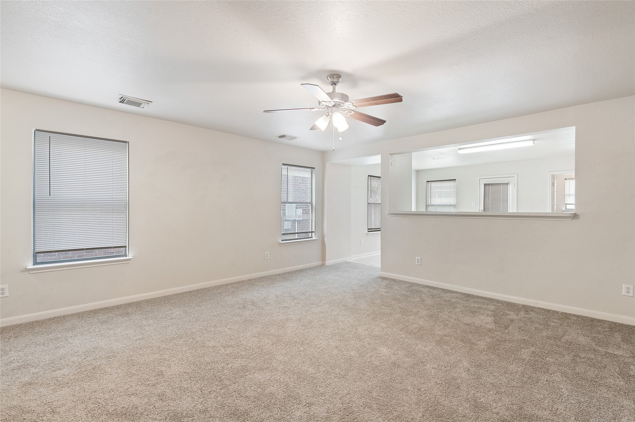 29522 Legends Stone Drive Spring, TX 77386 - Photo 4 of 17 a view of an empty room with a window