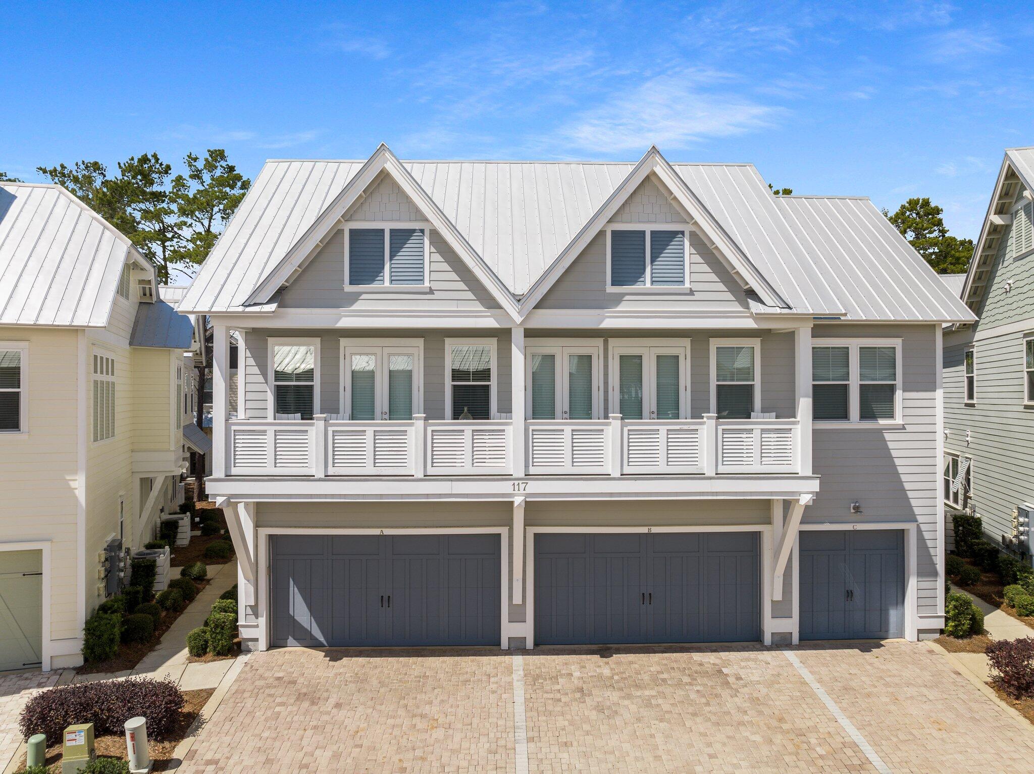 117 Pine Lands Loop Inlet Beach, FL 32461 - Photo 1 of 48 a view of a house with a yard and sitting area