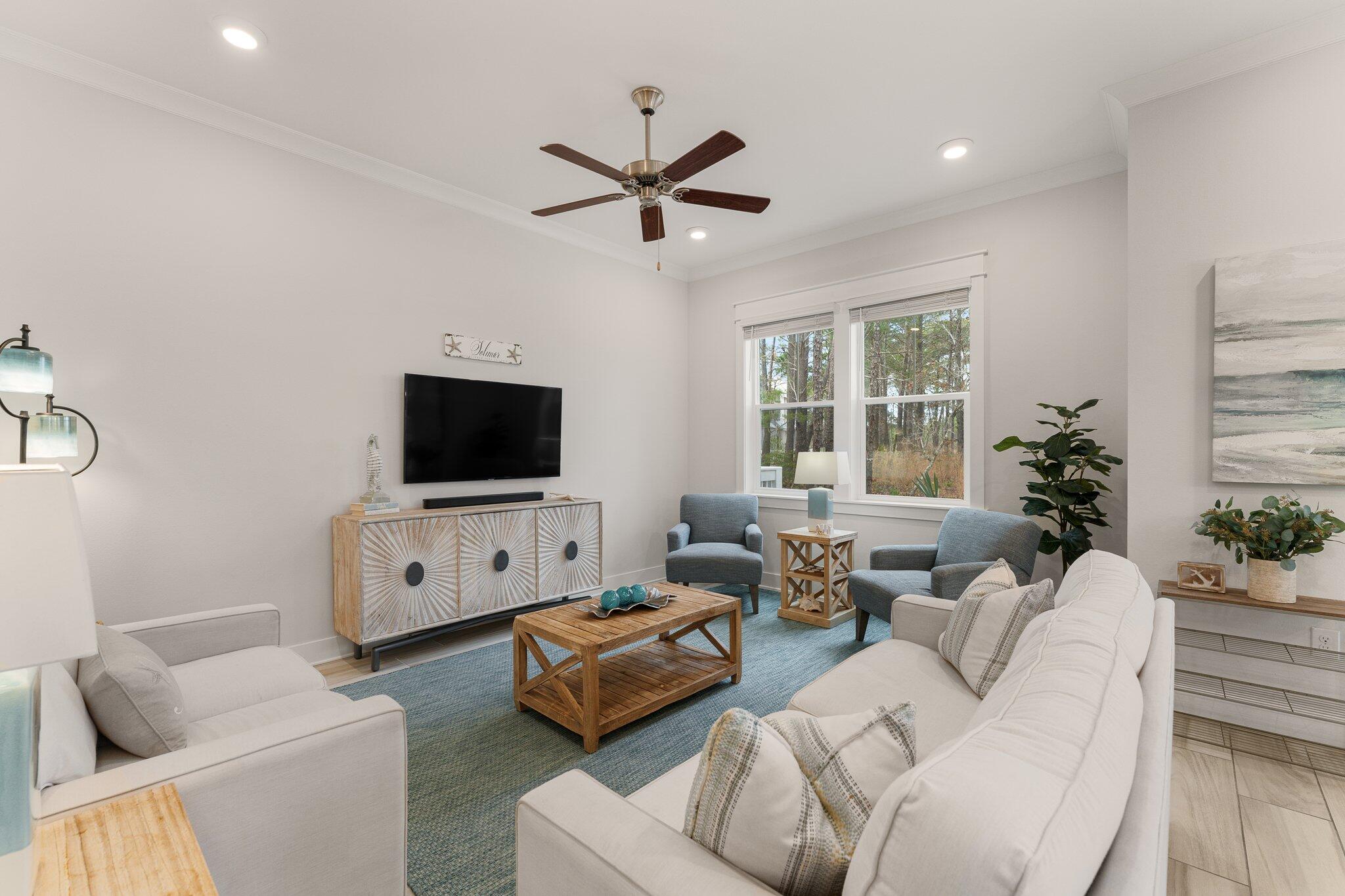 117 Pine Lands Loop Inlet Beach, FL 32461 - Photo 12 of 48 a living room with furniture and a flat screen tv