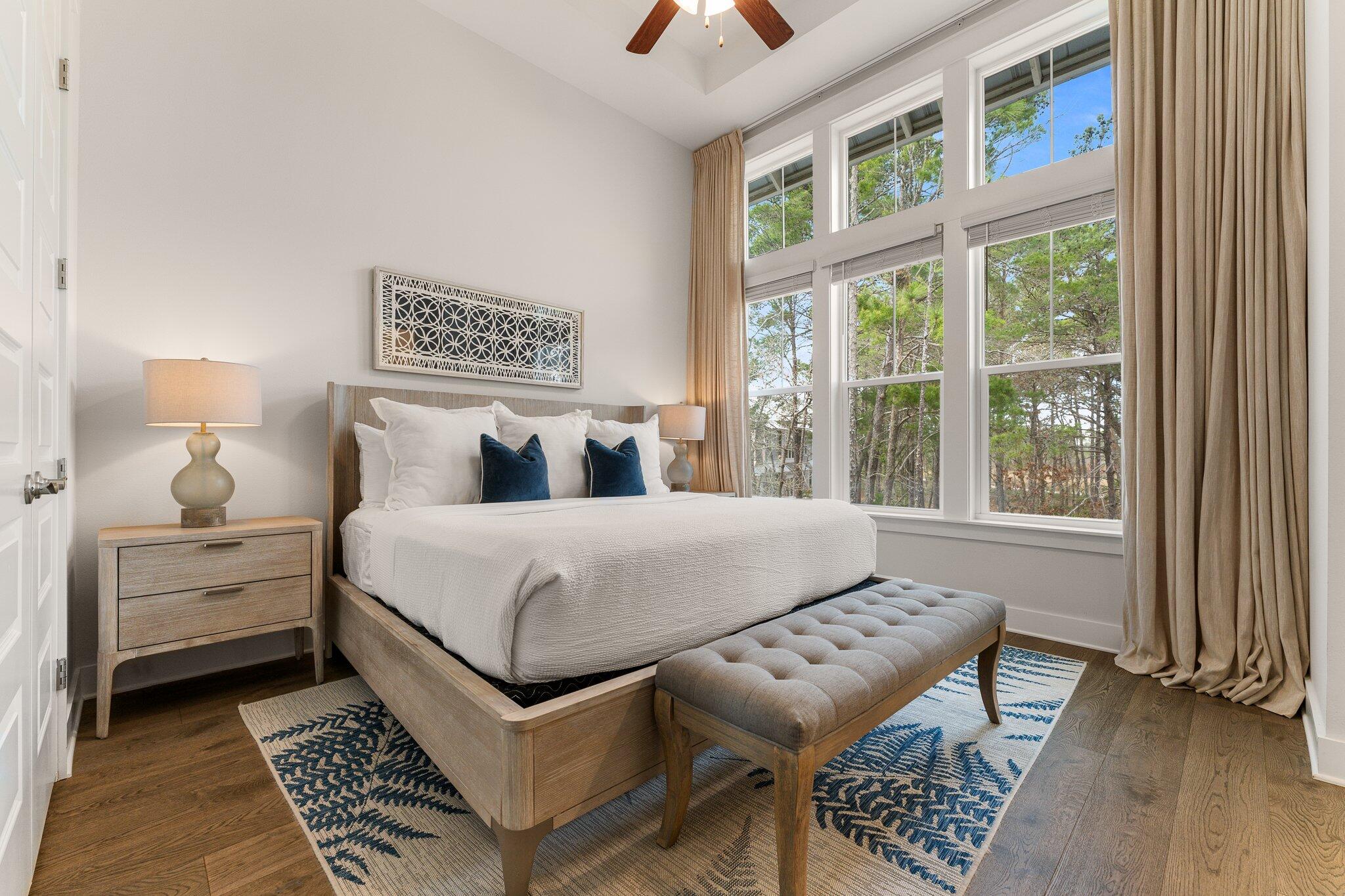 117 Pine Lands Loop Inlet Beach, FL 32461 - Photo 17 of 48 a bedroom with a bed and a window