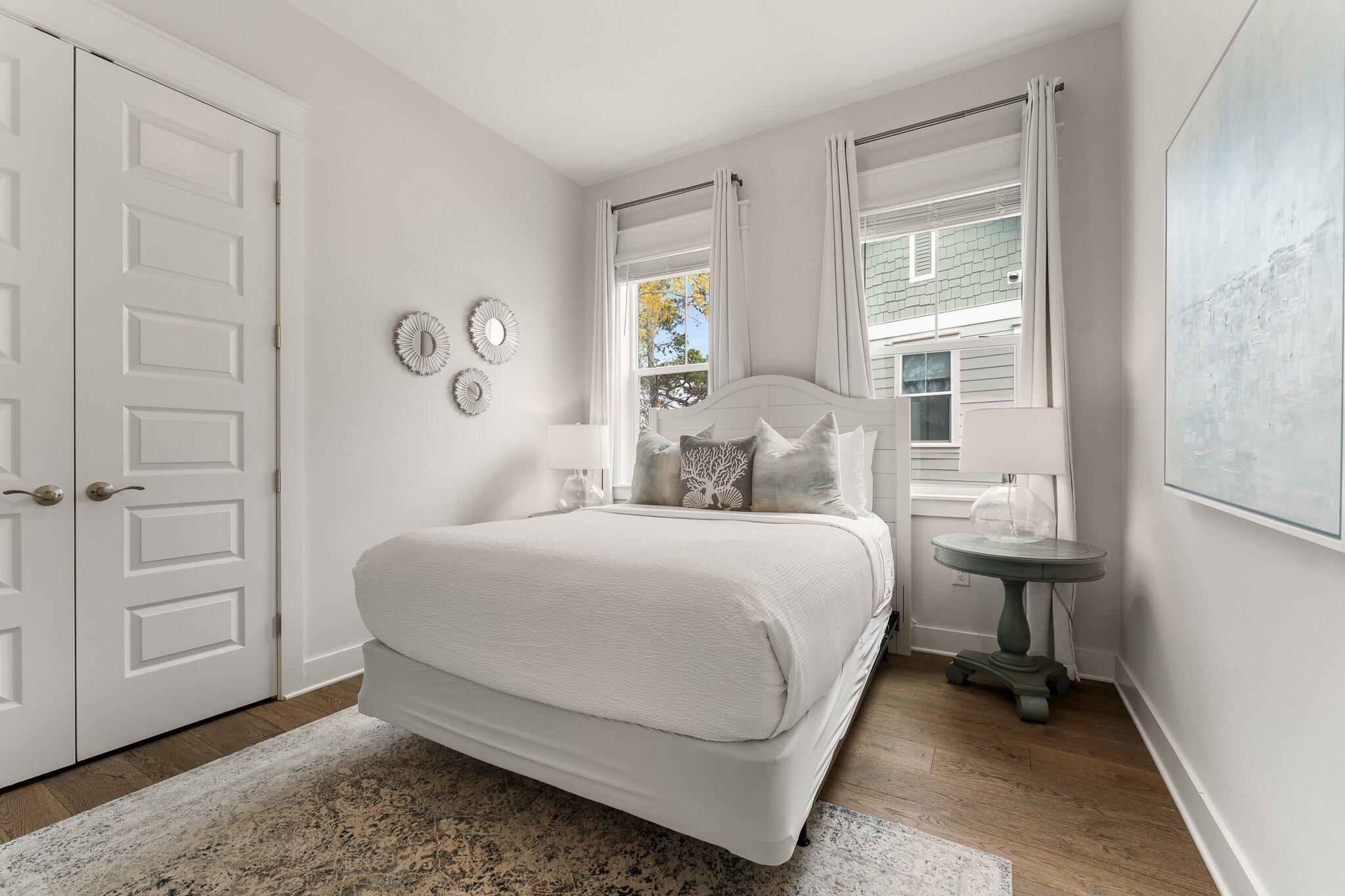 117 Pine Lands Loop Inlet Beach, FL 32461 - Photo 22 of 48 a bedroom with a bed and window