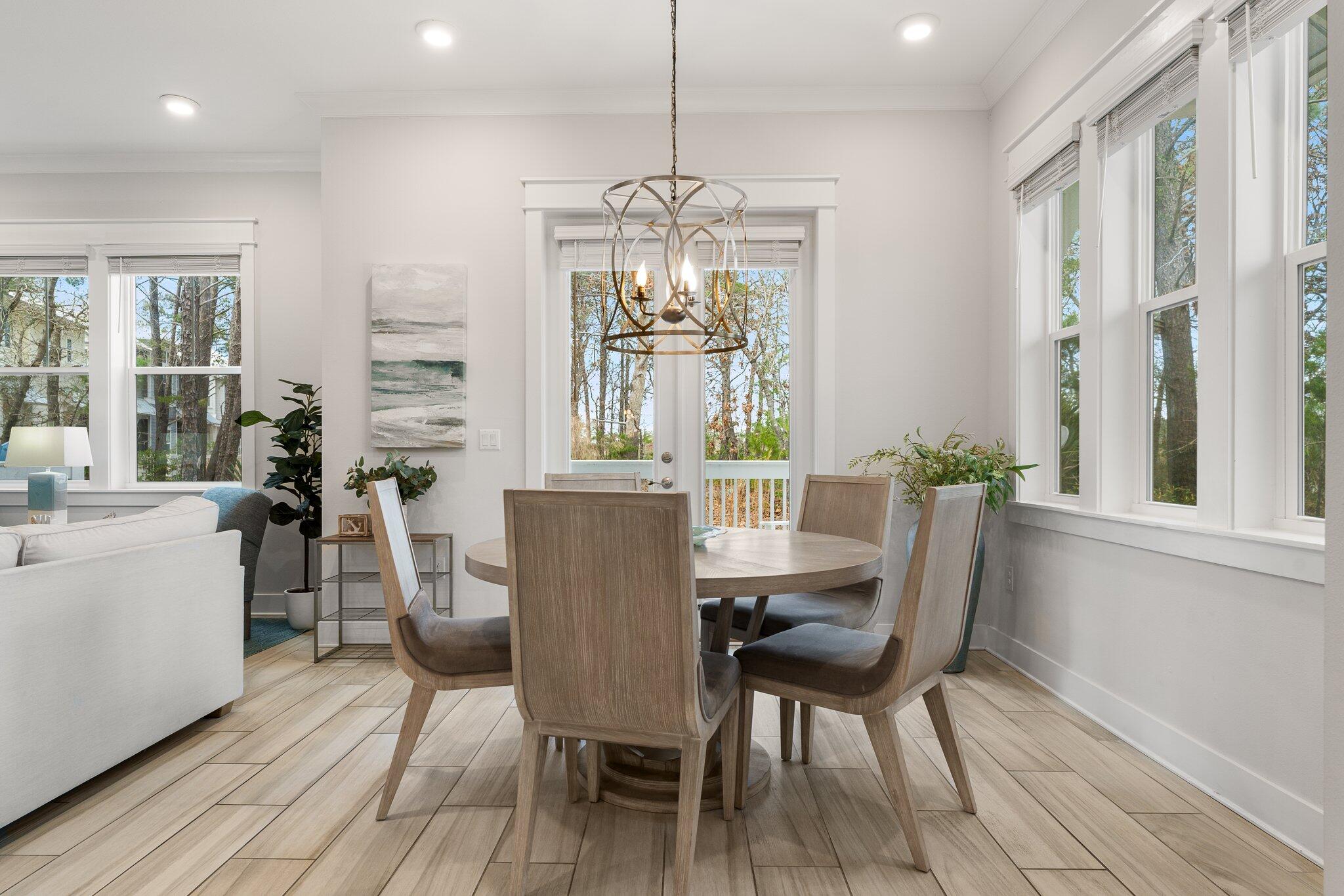 117 Pine Lands Loop Inlet Beach, FL 32461 - Photo 10 of 48 a view of a dining room with furniture window and outside view