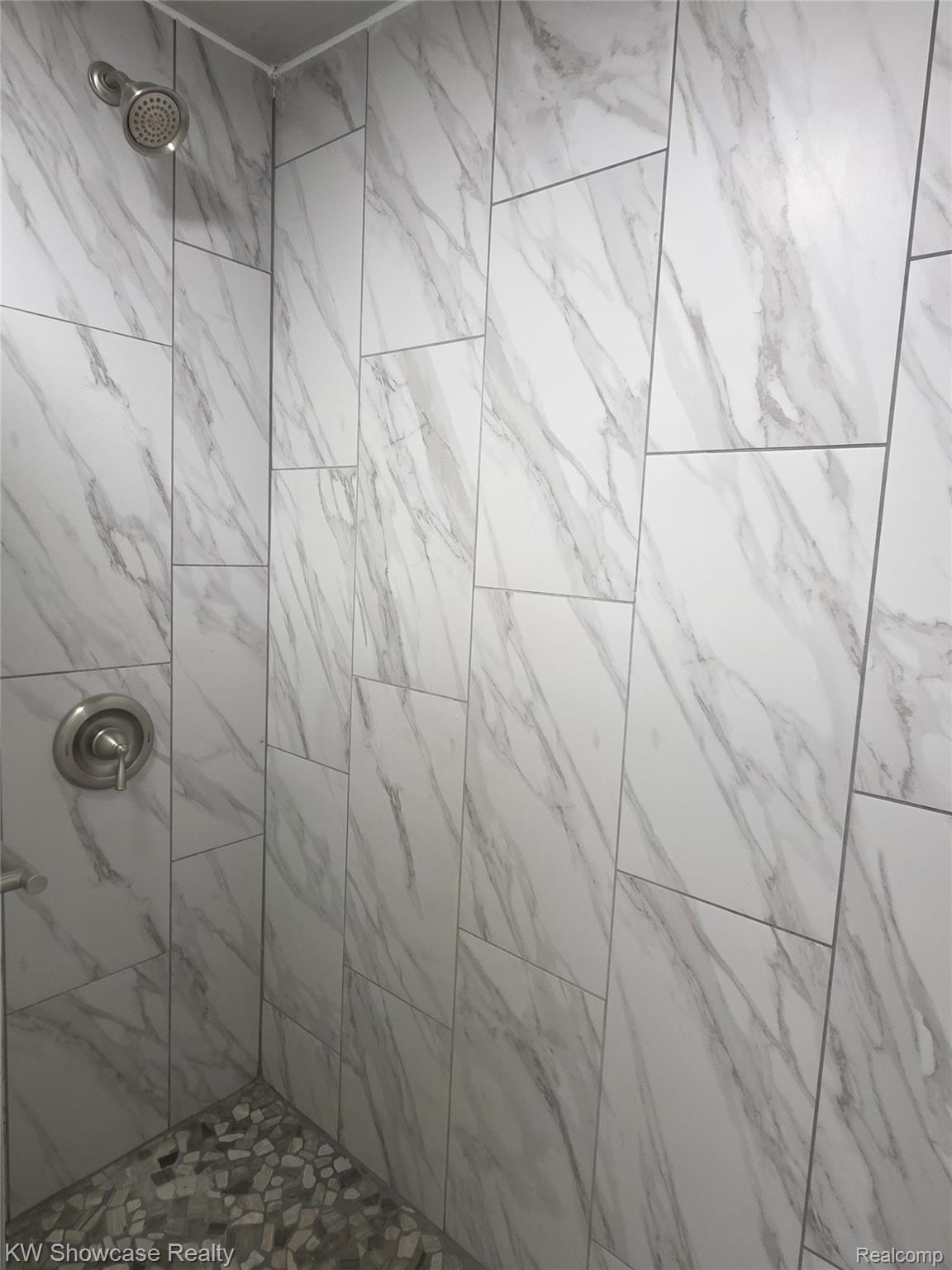 6354 Bennett Lake Road Fenton, MI 48430 - Photo 31 of 41 Full bath featuring a tile shower