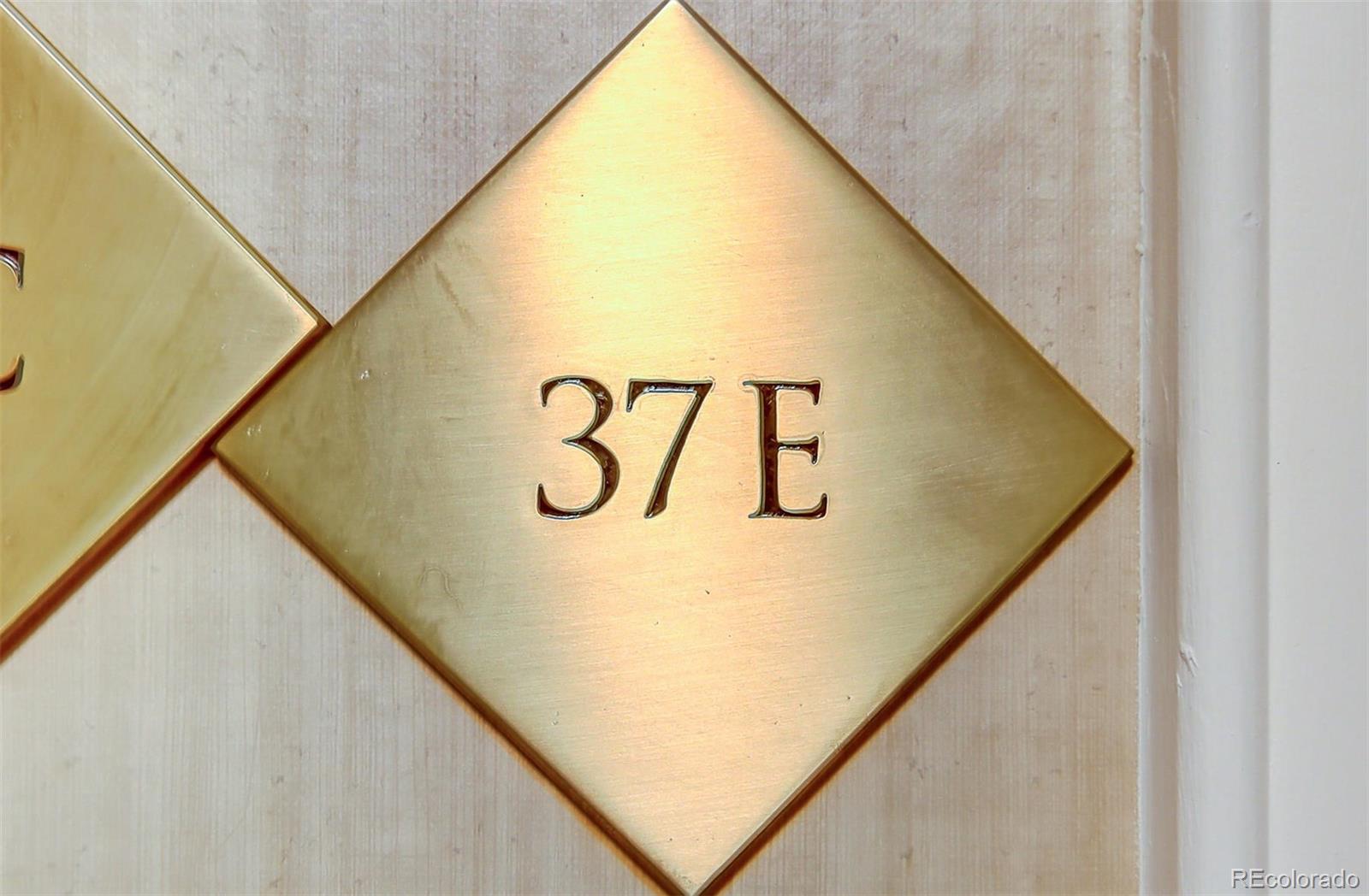 1020 15th Street, Unit 37E Denver, CO 80202 - Photo 23 of 48 a view of a wall with staircase