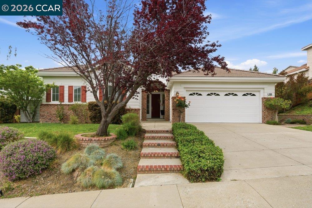 1009 Rolling Woods Way Concord, CA 94521 - Photo 1 of 69 front view of a house with a yard