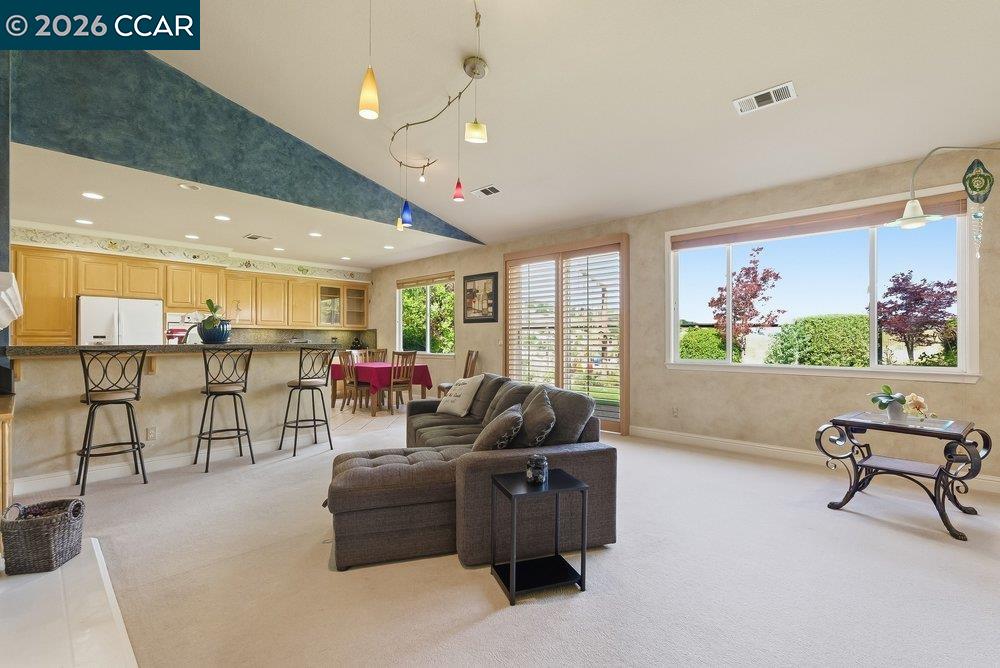1009 Rolling Woods Way Concord, CA 94521 - Photo 12 of 69 a living room with furniture and a flat screen tv