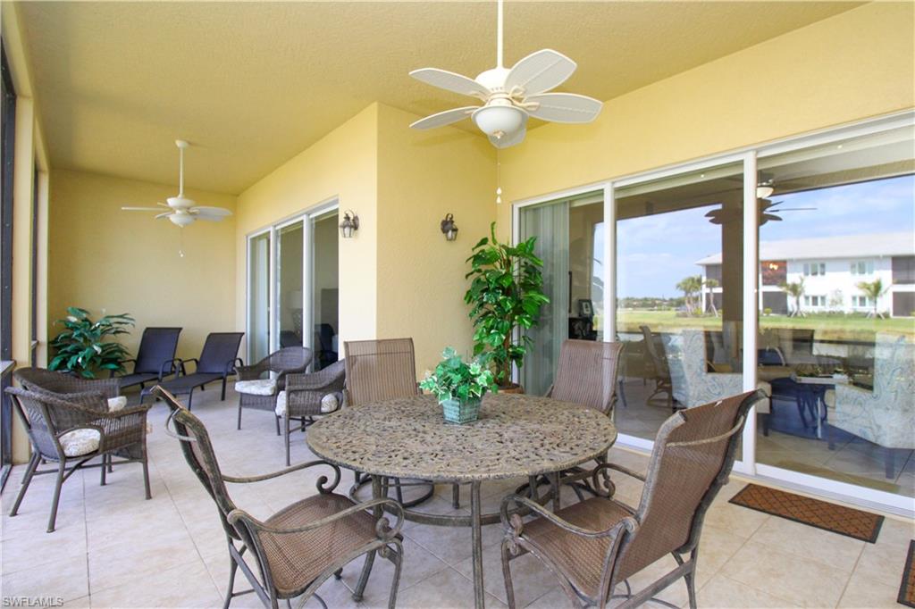 2713 Callista Court, Unit 103 Naples, FL 34114 - Photo 7 of 47 a view of a dining room with furniture window and outside view