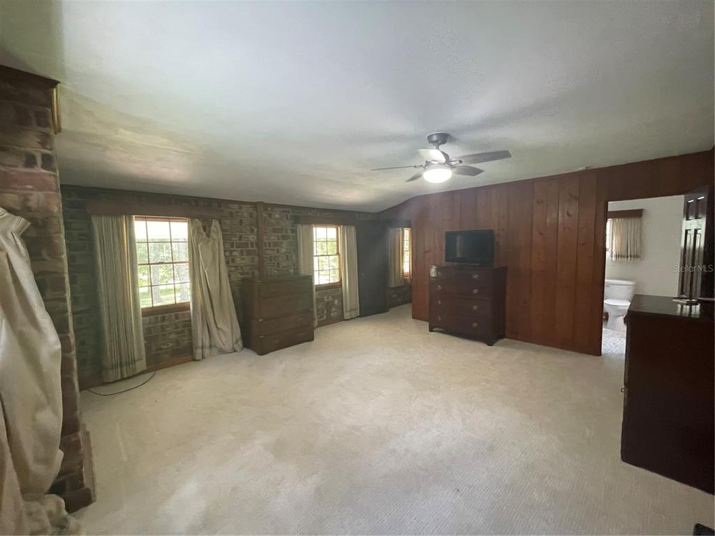 1801 Northwest 30th Terrace Gainesville, FL 32605 - Photo 25 of 36 a view of an empty room with a window