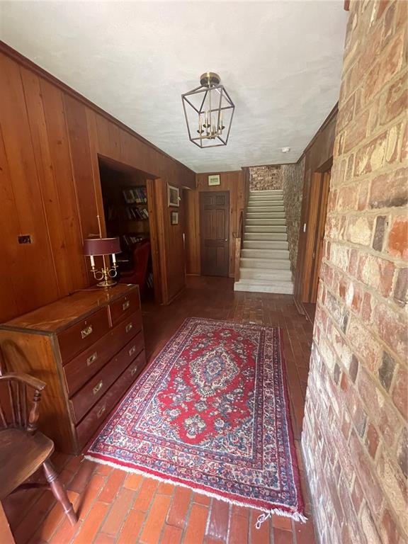 1801 Northwest 30th Terrace Gainesville, FL 32605 - Photo 4 of 36 a view of a hallway with furniture