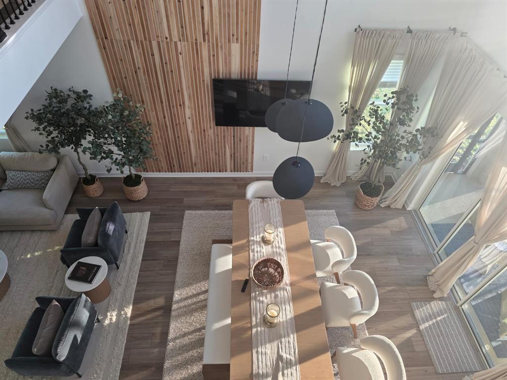 Undisclosed Address Reunion, FL 34747 - Photo 3 of 14 a table with chairs and a stove