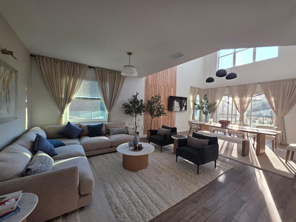 Undisclosed Address Reunion, FL 34747 - Photo 9 of 14 a living room with furniture fireplace and a large window