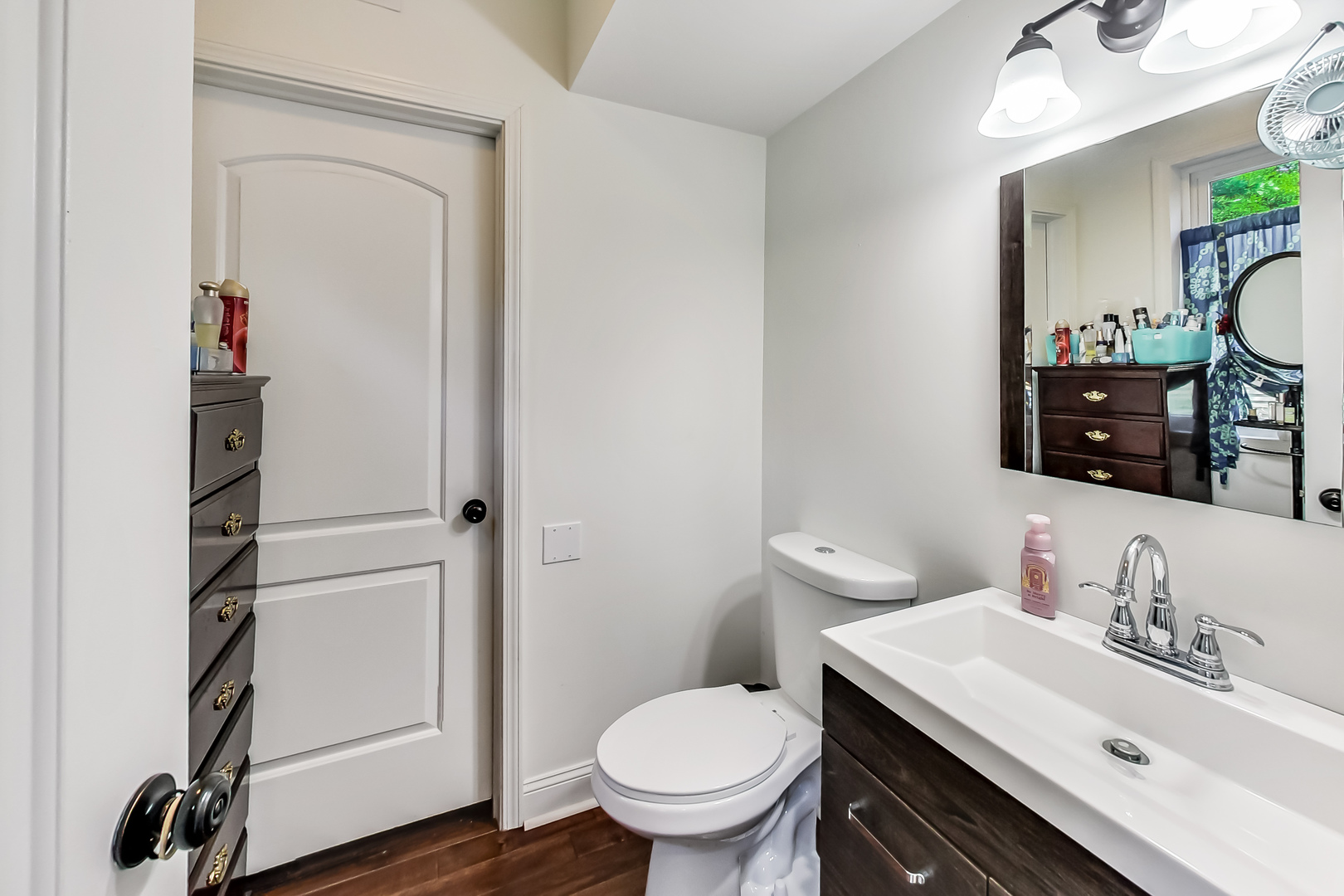 1518 Riverside Avenue St. Charles, IL 60174 - Photo 13 of 40 a bathroom with a granite countertop toilet sink and mirror