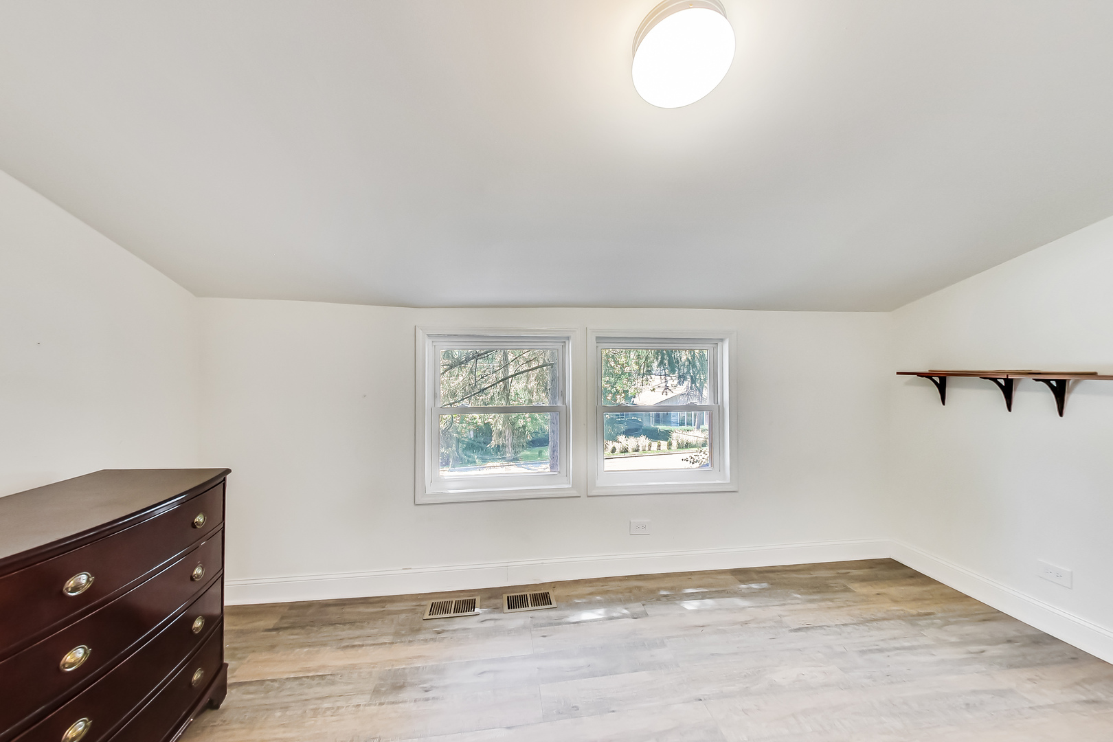 1518 Riverside Avenue St. Charles, IL 60174 - Photo 22 of 40 wooden floor in an empty room with a window