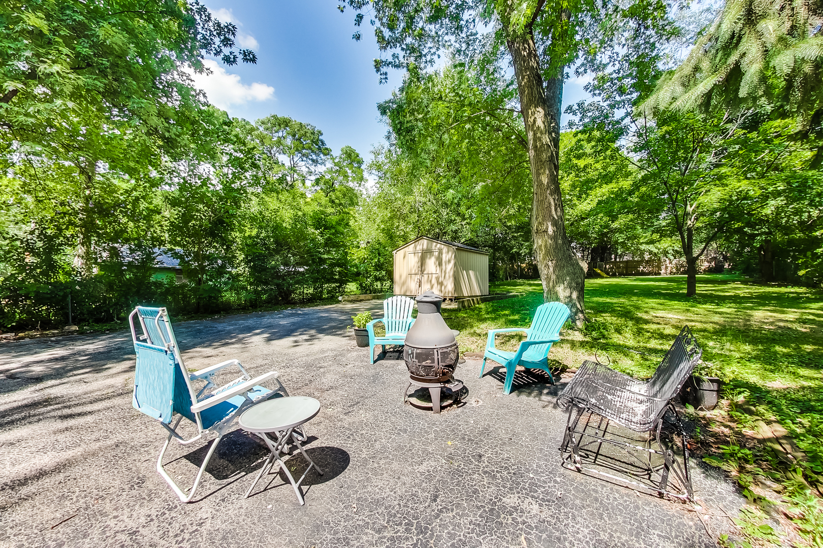 1518 Riverside Avenue St. Charles, IL 60174 - Photo 34 of 40 a view of a chairs and backyard with couches