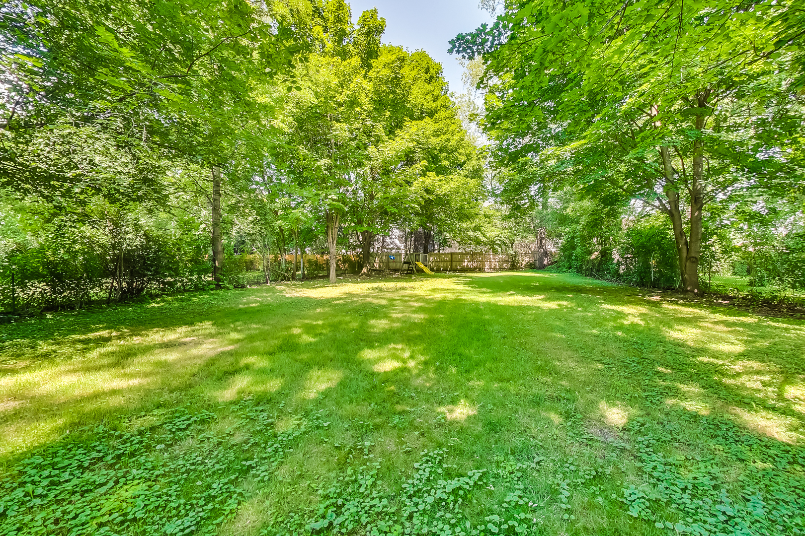 1518 Riverside Avenue St. Charles, IL 60174 - Photo 37 of 40 a view of a grassy field with trees