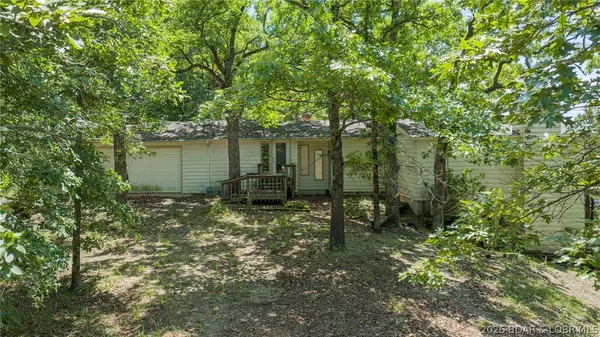$599,900 | 1063 Singing Oaks Drive, Sunrise Beach, MO 65079